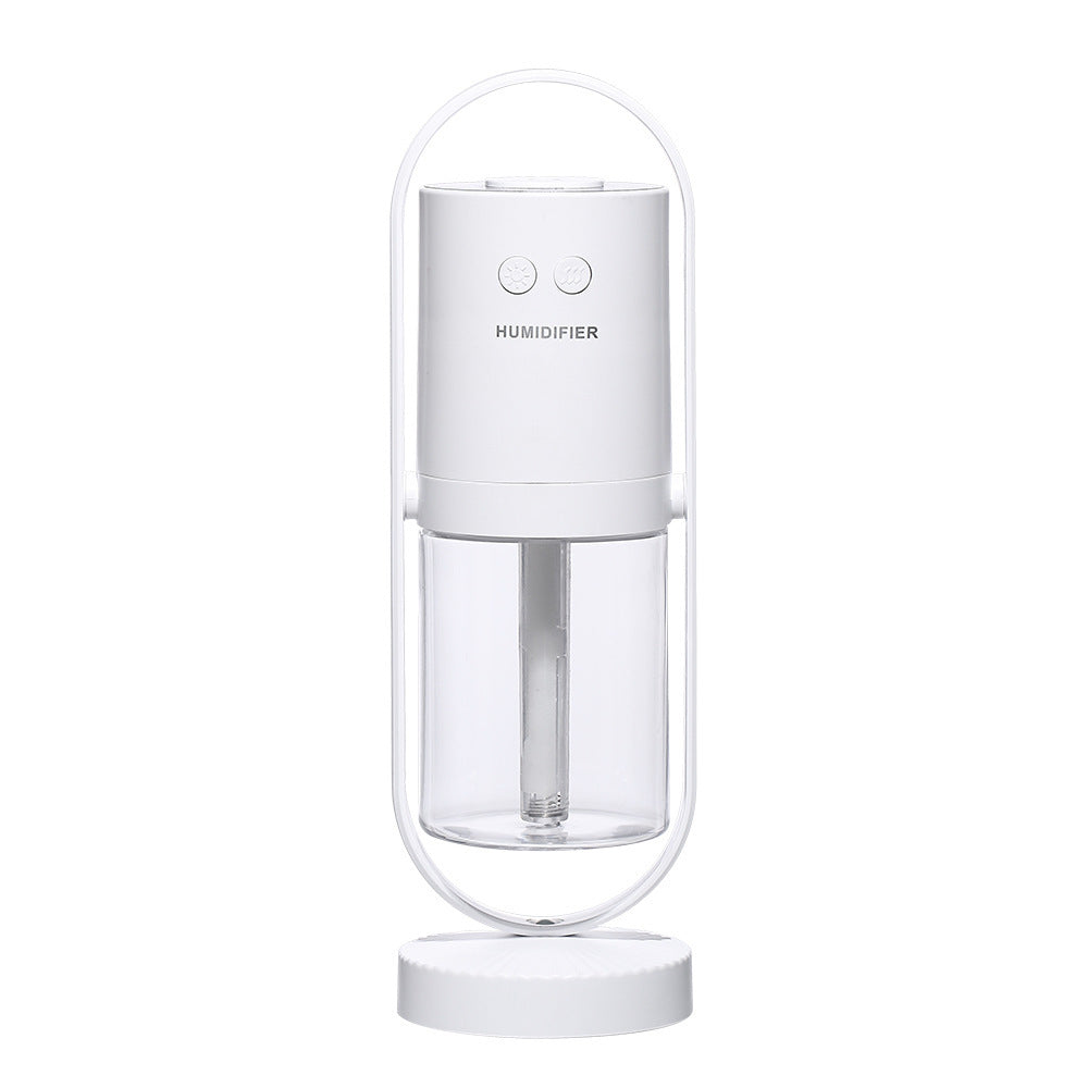 White USB ultrasonic air humidifier with cylindrical design and rounded base.