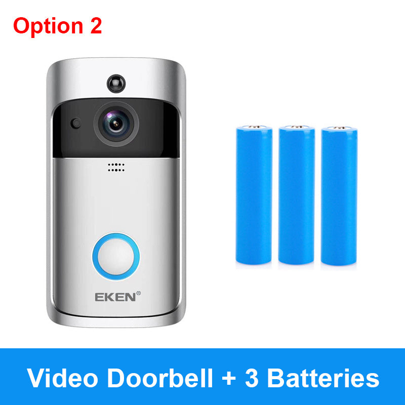 Silver smart video doorbell with camera lens and blue ring button, plus three blue batteries.