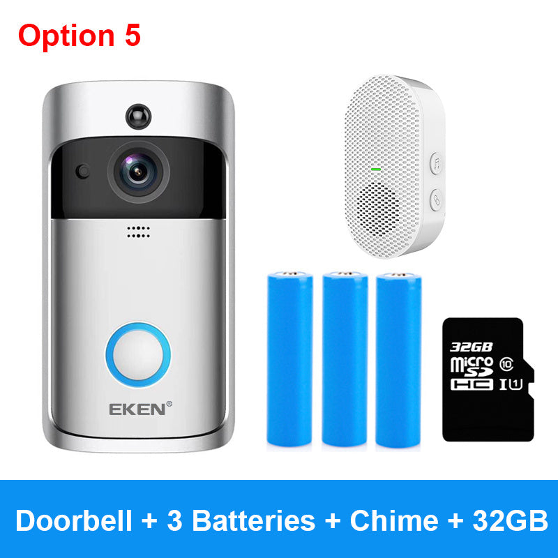 Silver smart doorbell with camera lens, three blue batteries, white wireless chime, and 32GB microSD card.