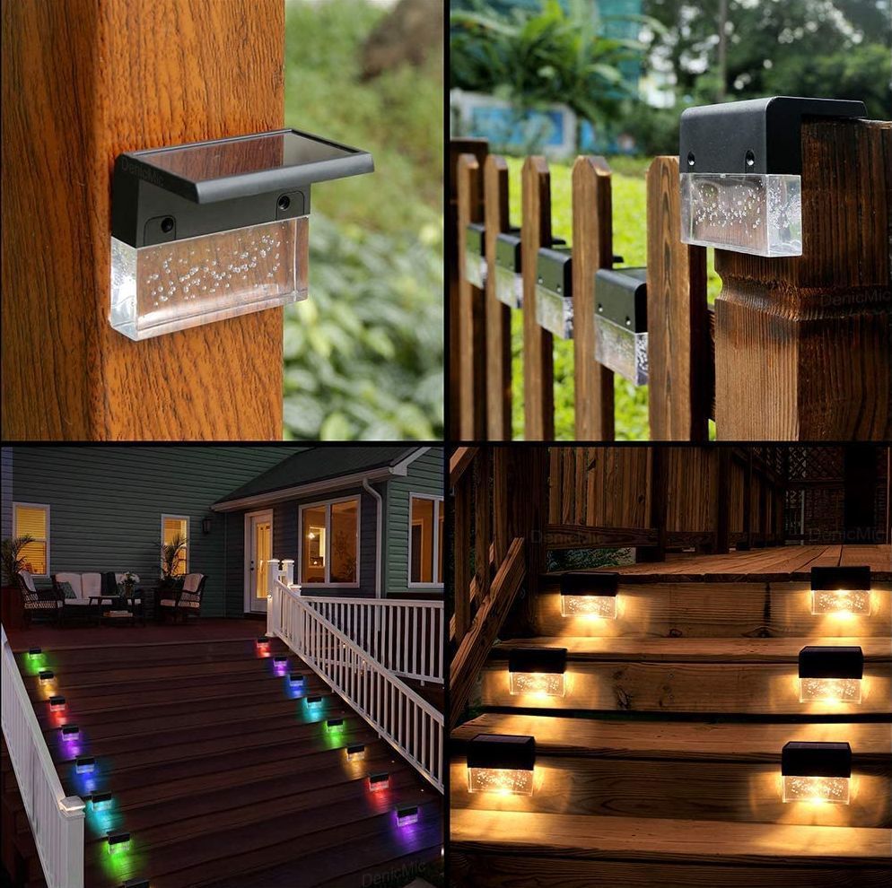 Black solar-powered LED fence and step lights with waterproof housing and clear textured lens.