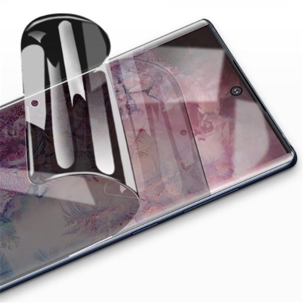 Clear full screen privacy film protector partially peeled off a curved-edge smartphone screen.