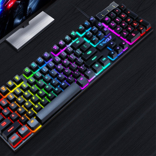 Black wired gaming keyboard with RGB backlit keys and floating keycaps on a dark surface.
